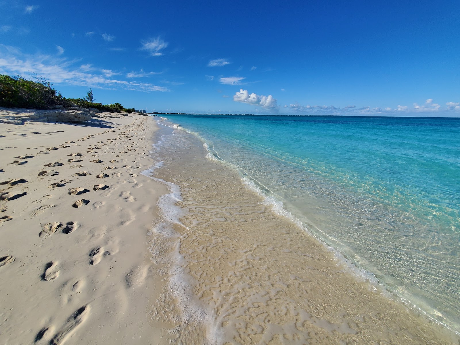 Photo of Sunset beach with turquoise pure water surface