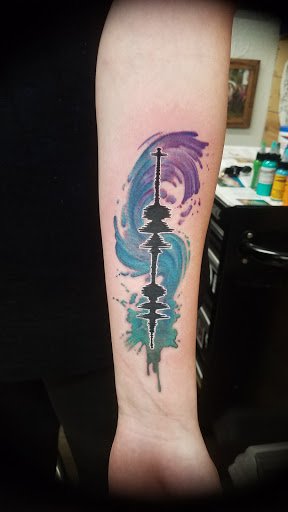 Explore womb tattoo ideas, creative tattoo ideas in San Diego, available at Funhouse Tattoo