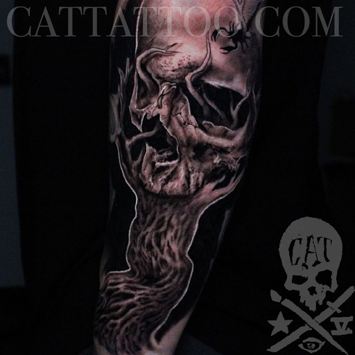 Explore tattoo ideas back arm, creative tattoo ideas in Addison, available at Cat Tattoo