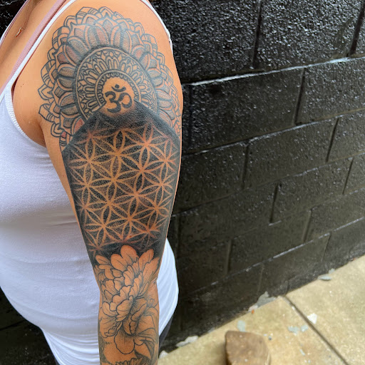 Explore brass knuckle tattoo ideas, creative tattoo ideas in Buffalo, available at True Gloom Tattoo Studio