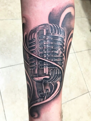 Explore rapper tattoos ideas, creative tattoo ideas in Phoenix, available at Grand Avenue Tattoo & Piercings