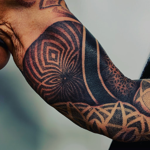 Explore baptism tattoo ideas, creative tattoo ideas in Mount Clemens, available at Hand & Heart Tattoo