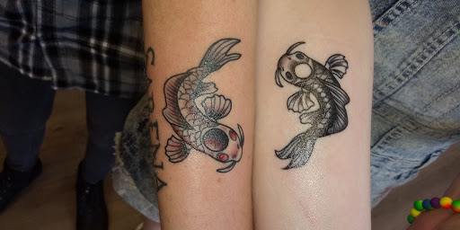 Find sapphic tattoo ideas for your next unique tattoo in Grovetown at Art Collective Tattoos & Piercings