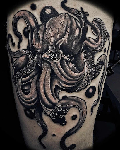 Explore child tattoo ideas, creative tattoo ideas in Redding, available at Dominant Ink