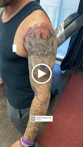 Explore scroll tattoo ideas, creative tattoo ideas in Belmont, available at The Body Art Gallery