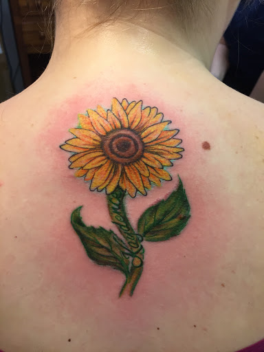 Explore tattoo ideas for roses, creative tattoo ideas in Brunswick, available at Blue Fin Tattoos