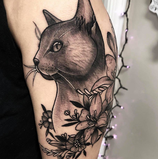 Explore majora's mask tattoo ideas, creative tattoo ideas in Burlington, available at Inferno Ink Tattoo & Body Piercing Studio