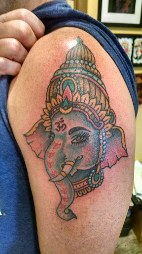 Explore cake tattoo ideas, creative tattoo ideas in Decatur, available at Kingdom Tattoo