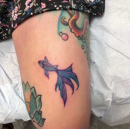 Explore travel tattoos ideas, creative tattoo ideas in New York, available at Red Baron Ink Tattoo and Piercing