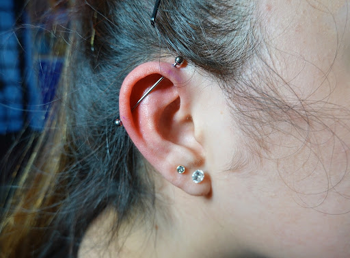 Explore cross tattoo ideas for woman, creative tattoo ideas in Newport, available at Stix N Studz