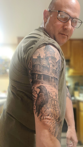 Explore chest tattoo ideas for guys, creative tattoo ideas in Woodside, available at Fiction Tattoo Inc.