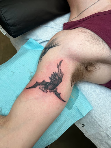 Explore small dog tattoos ideas, creative tattoo ideas in Senoia, available at Cornerstone Tattoo Gallery