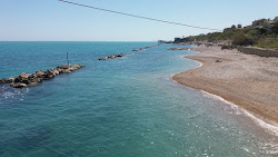 Valle Grotte Beach'in fotoğrafı geniş bir kıyı şeridi ile birlikte