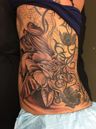 Explore armband tattoo ideas for men, creative tattoo ideas in Fargo, available at Golden Dragon Tattoo