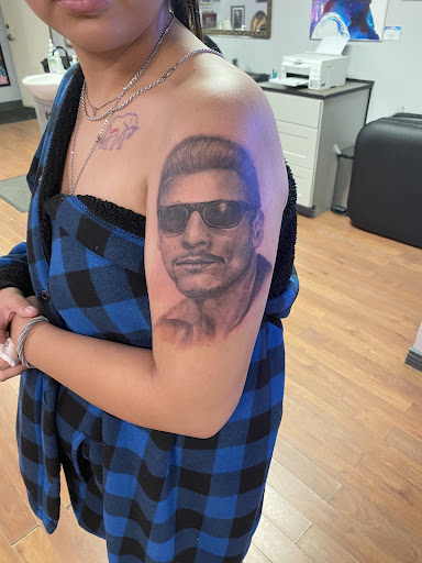 Explore arm tattoo placement ideas, creative tattoo ideas in Beaumont, available at Roots Tattoo Studio