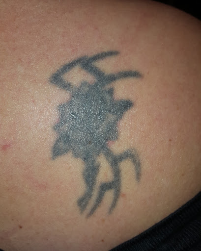 Explore mens tattoo ideas leg, creative tattoo ideas in Wichita, available at Evicted Ink Laser Tattoo Removal