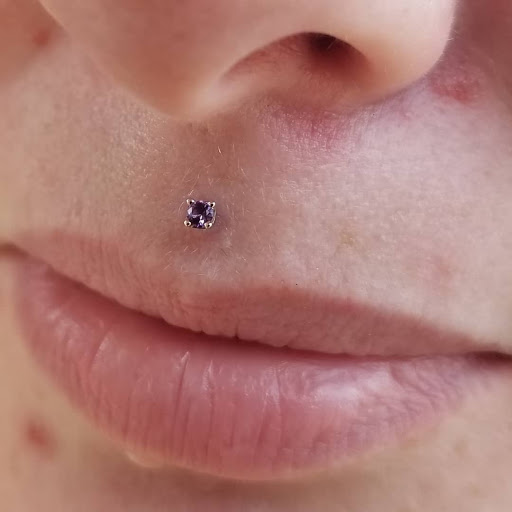 Explore cover up tattoo ideas on arm, creative tattoo ideas in Arlington, available at Urbans Tattoo & Piercing Studio