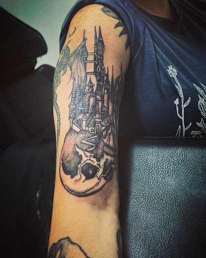 Explore cross tattoo ideas male, creative tattoo ideas in Cocoa, available at Rorschach Tattoo Shop and Piercing Studio