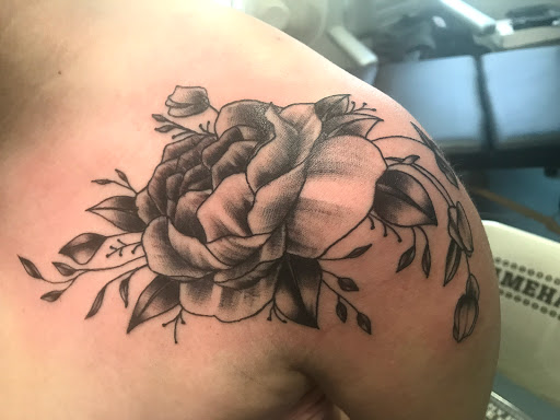 Explore lower arm sleeve tattoo ideas, creative tattoo ideas in Muncie, available at The Tattoo Studio