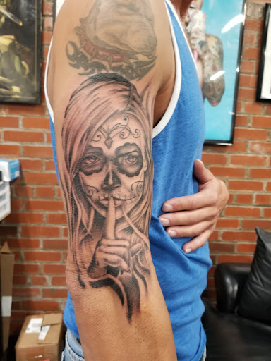 Tattoo Shop «Almighty Tattoo ( Under new ownership now Loyalty Tattoo Company!!!!)», reviews and photos, 5337 S Dort Hwy, Flint, MI 48507, USA