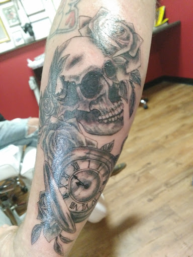 Explore rattlesnake tattoo ideas, creative tattoo ideas in Akron, available at Knuckle Up Ink Tattoos