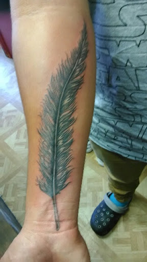 Explore vertical tattoo ideas, creative tattoo ideas in Los Angeles, available at South Central Tattoos