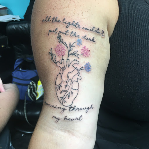 Explore arm tattoo ideas for women, creative tattoo ideas in Monticello, available at 850 Tattoo Co.