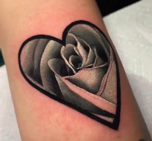 Explore half leg sleeve tattoo ideas for men, creative tattoo ideas in Fort Wayne, available at Grade A Tattoos and Body Piercing