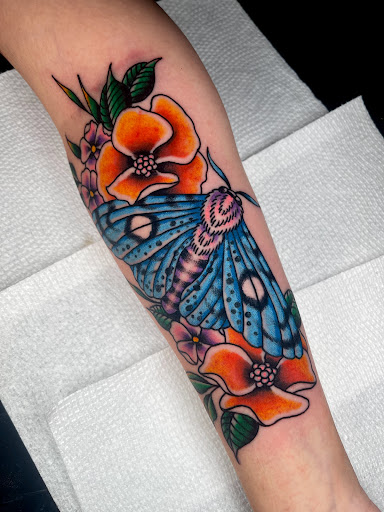 Explore skull rose tattoo ideas, creative tattoo ideas in Johnson City, available at Gold Cross Tattoo Co.