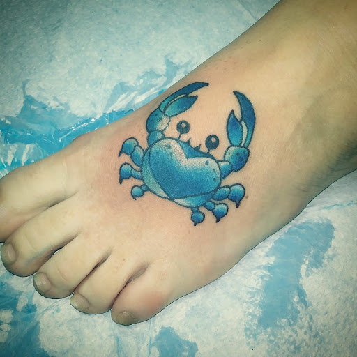 Explore shield tattoo ideas, creative tattoo ideas in Saint Augustine, available at Ms. Deborahs Fountain of Youth Tattoo & Body Piercing