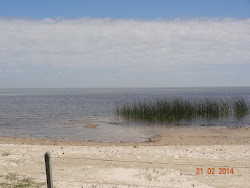 Photo de Sao Simao Beach avec rivage droit, long