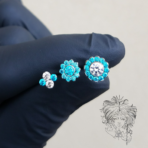 Explore gear tattoo ideas, creative tattoo ideas in Baton Rouge, available at Deja Vu Piercing Studio