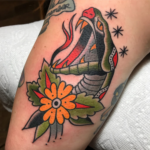 Explore small fine line tattoo ideas, creative tattoo ideas in Lakeland, available at Black Swan Tattoo