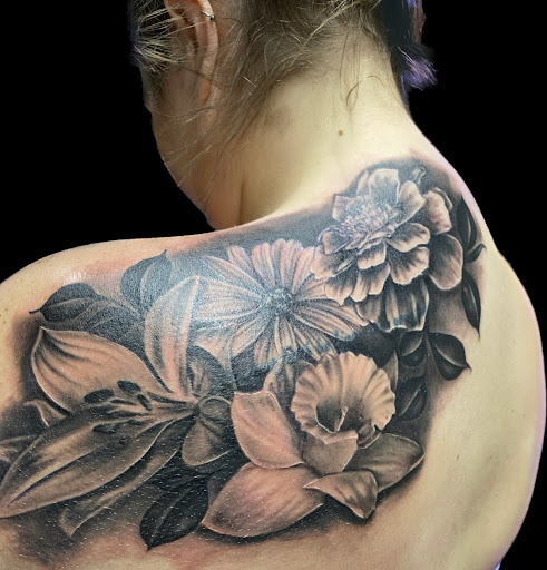 Explore dirtbike tattoo idea, creative tattoo ideas in Weatherford, available at Weatherford Tattoo Co.