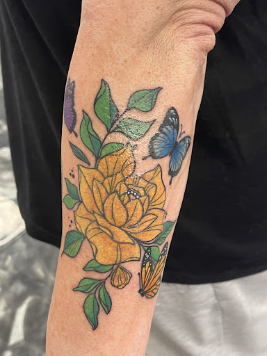 Explore tattoo ideas for my son, creative tattoo ideas in Fayetteville, available at Sacred Raven Tattoo Shop