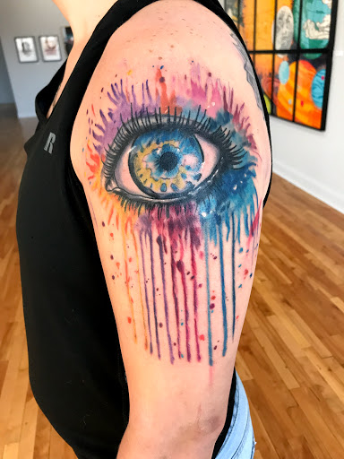 Explore mountain bike tattoo ideas, creative tattoo ideas in Kansas City, available at Golden Stag Tattoo and Gallery
