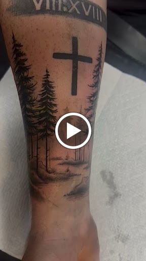 Explore garter tattoo ideas, creative tattoo ideas in Monroe, available at Skin City Tattoo Studio