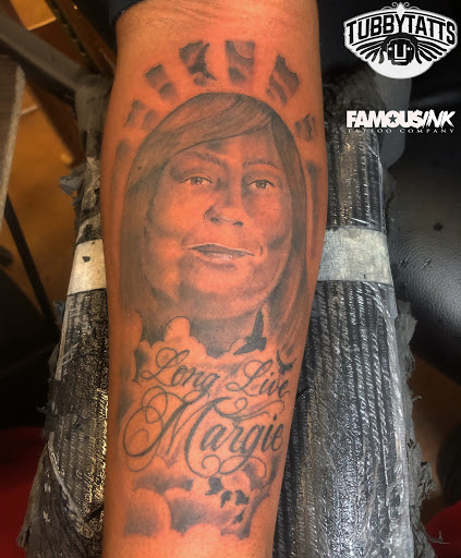 Explore bear tattoo ideas for men, creative tattoo ideas in Hammond, available at Famous Ink, Inc.