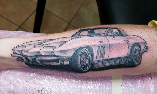 Explore reading tattoo ideas, creative tattoo ideas in Saint Augustine, available at Ms. Deborahs Fountain of Youth Tattoo & Body Piercing