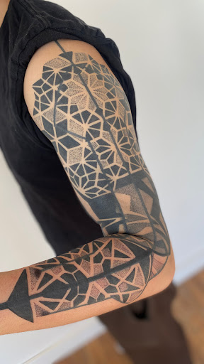 Explore mens family tattoo ideas, creative tattoo ideas in Tacoma, available at Tsunami Tattoo