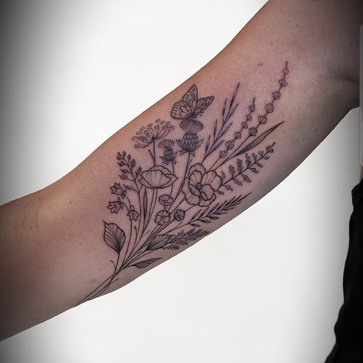 Explore women's forearm tattoo ideas, creative tattoo ideas in Abington, available at Tattoo Galaxy (Abington) Piercing and Custom Tattoos