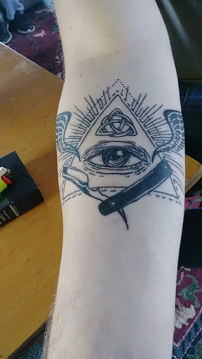 Explore pet memorial tattoo ideas, creative tattoo ideas in Ithaca, available at Artistic Point Tattoo Company