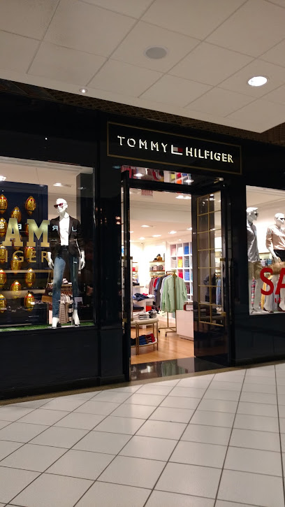 Logo da empresa - Tommy Hilfiger