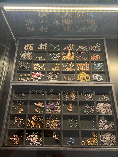 Explore fine line name tattoo ideas, creative tattoo ideas in Sheridan, available at The Poke Palace