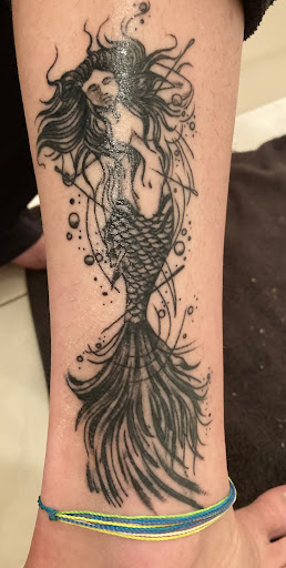 Explore men forearm tattoo ideas, creative tattoo ideas in Largo, available at Alchemy Tattoos and Body Piercings