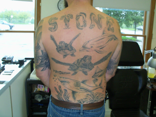 Explore forearm sleeve tattoo ideas, creative tattoo ideas in Pelham, available at Tattoo Fever