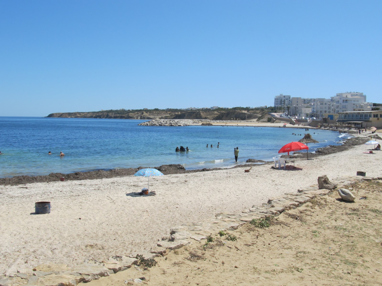 Foto von Plage les palmiers mit kleine bucht