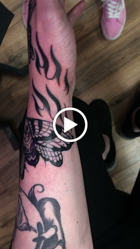 Explore grizzly bear tattoo ideas, creative tattoo ideas in North Tonawanda, available at Dark Side Ink Tattoo Studio