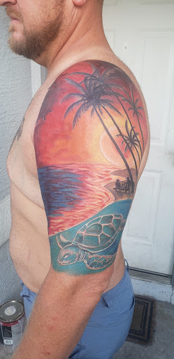 Explore wedding ring tattoo ideas for him, creative tattoo ideas in Ocoee, available at Slaughterized Ink Tattoo and Piercing Studio