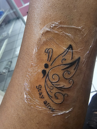 Explore unique semicolon tattoo ideas, creative tattoo ideas in Fort Pierce, available at South Florida Tattoo Co Inc